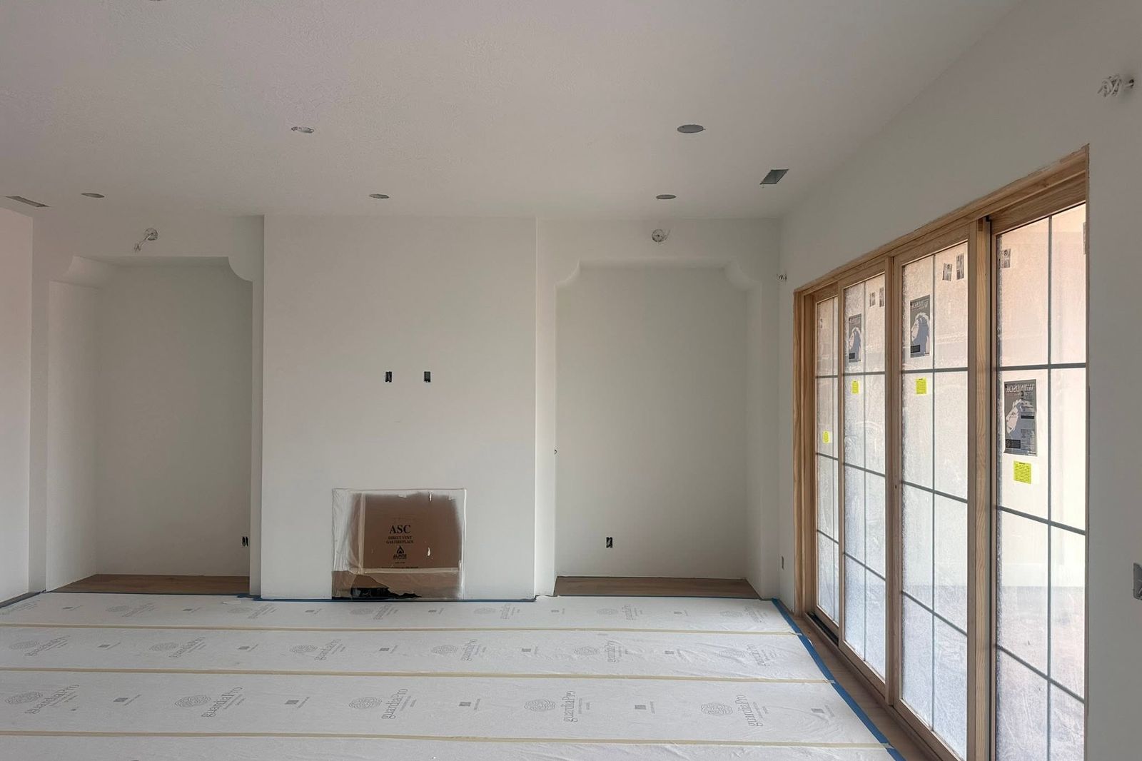Arched foam niches and a shaped opening in a home under construction