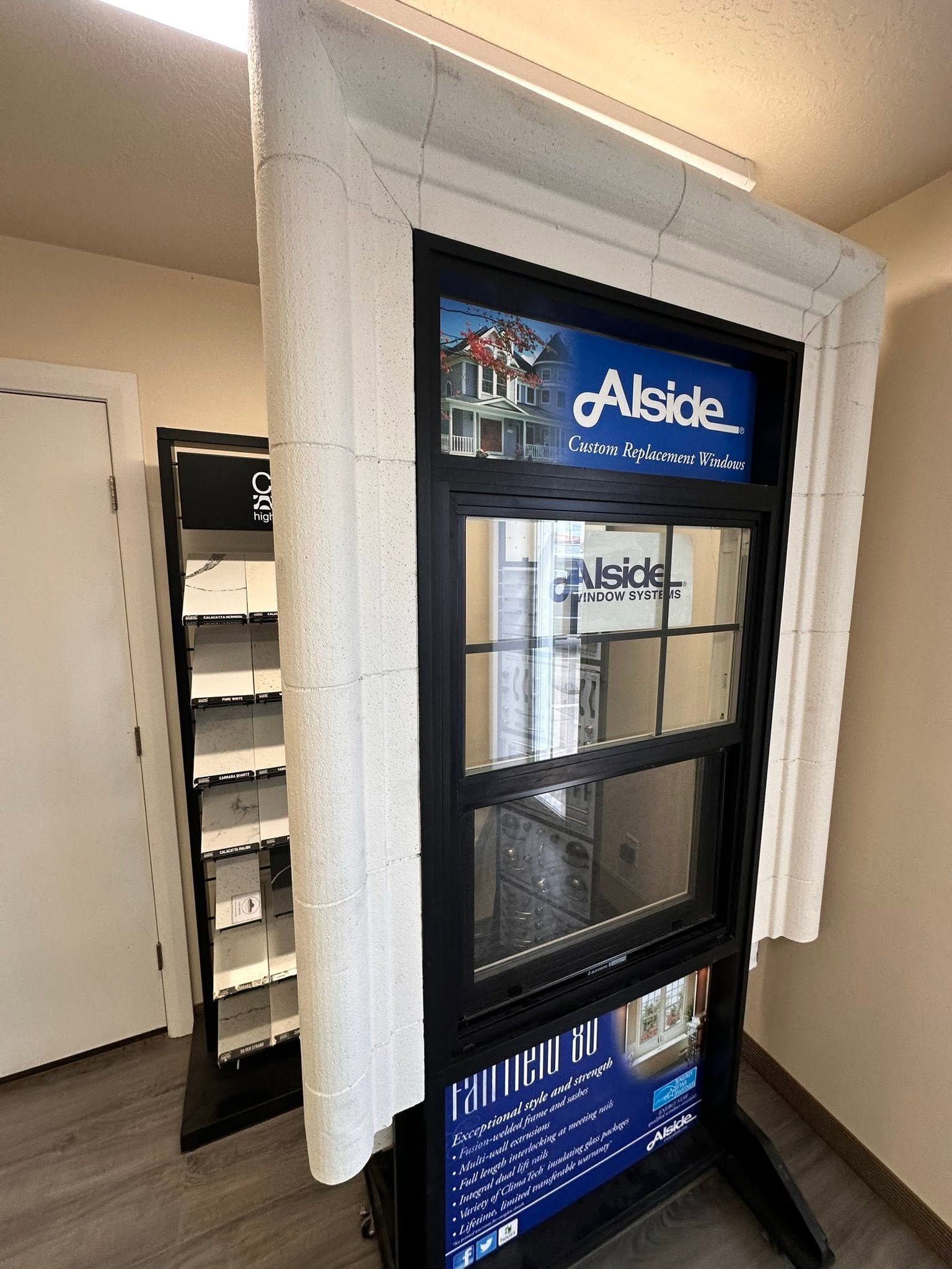 A foam window surround built around a window display in the showroom